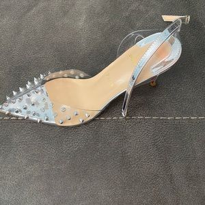 Spiked red bottom heels